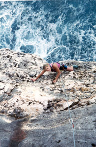 Sue Rusch enjoying Spermy the Whale (5.11c/d)
