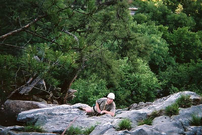 Admiring old pitons on the third pitch of Bunny (5.4)