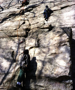 Jay and Eric attempting to climb Sundown (5.8) in tandem