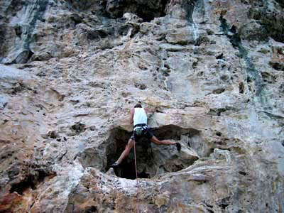 John leading Shooting the Curl, 5.10a, at Cayman Brac