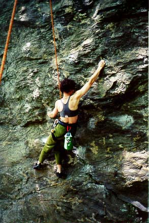 Lisa on Arm and Hammer (5.11) at Rumney