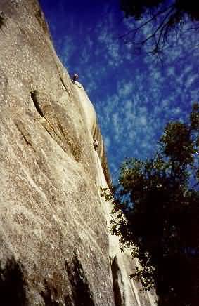 Me climbing and Karl belaying on Lunatic Fringe (5.10c)